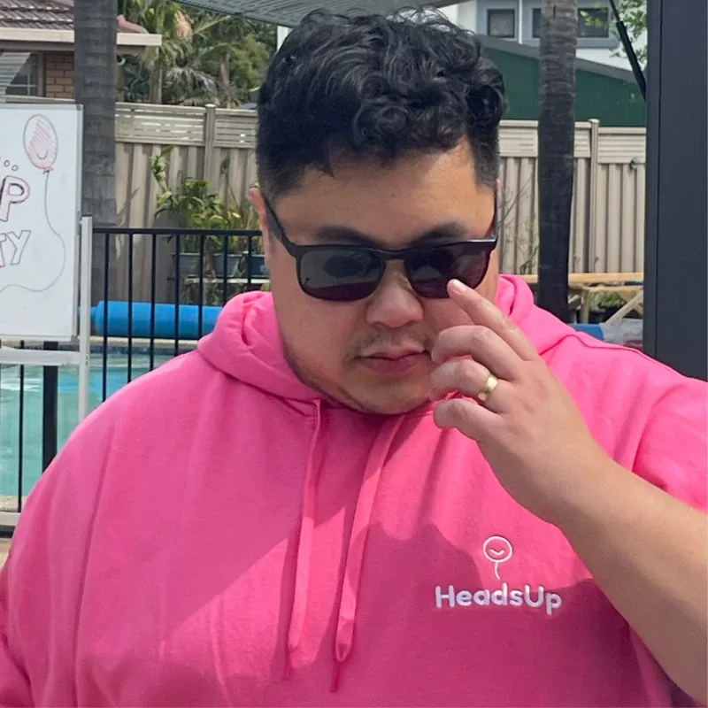 Henry Huynh (Henners) in a HeadsUp hoodie